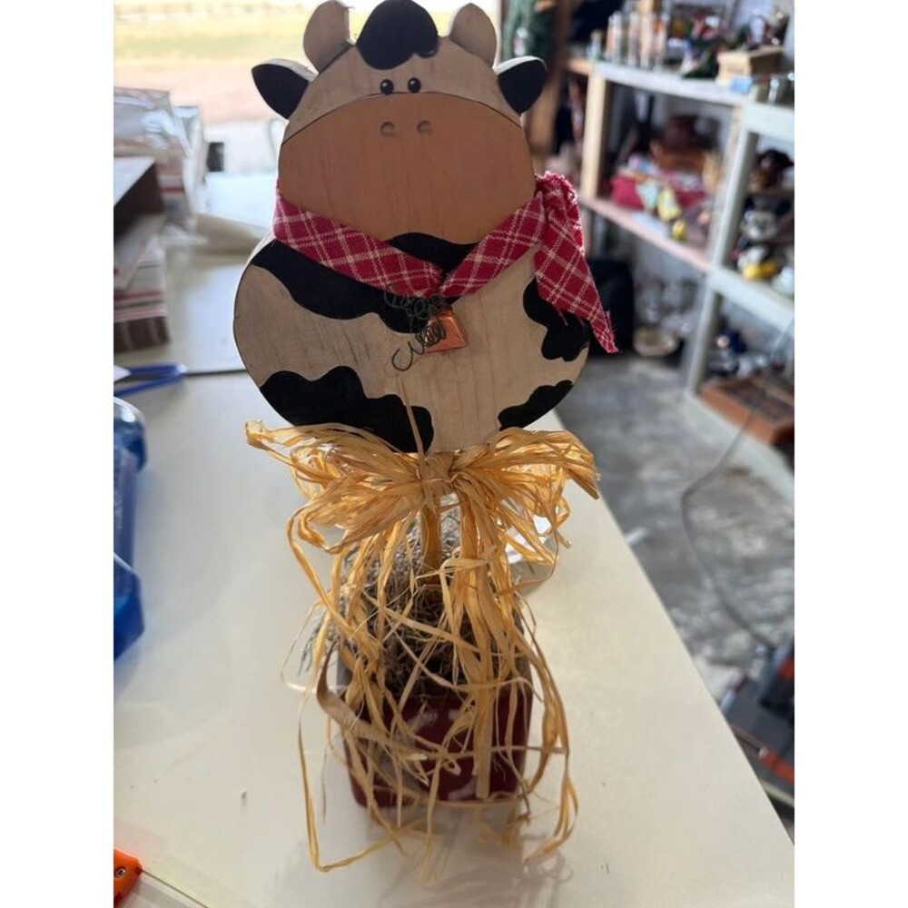 Primitive Wooden Cow Farmhouse Décor With Raffia and Distressed Red Base